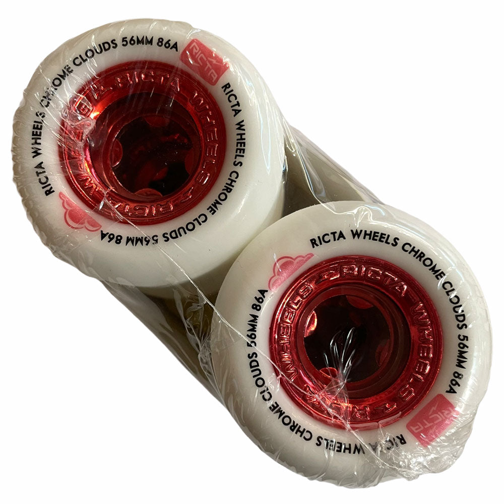 Two white all-terrain wheels with red transparent centers, stacked and wrapped in clear plastic. Labeled Ricta Chrome Clouds 54mm 86A, ideal for smooth rides on various surfaces.