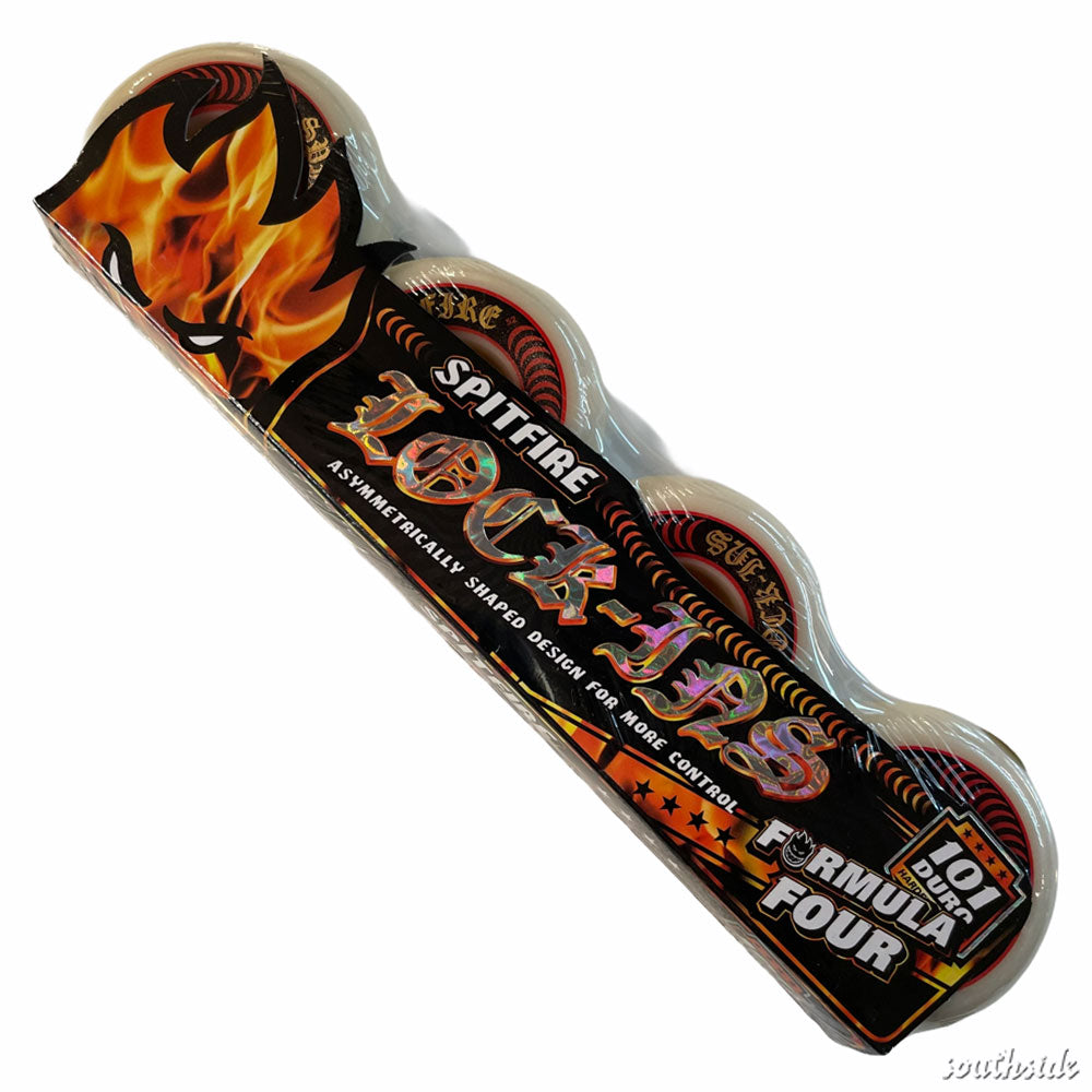 The Spitfire Wheels F4 Lock In 52mm101A four-pack features flame graphics, a cartoon flaming face, and bold packaging text. The wheels' asymmetrical shape ensures top performance and control for skateboarders.