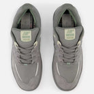 A top-down view of the 1010 PS Tiago Lemos Slate Grey Sea Salt New Balance Numeric Suede Skateboarding Shoes, featuring mesh and suede details, laced up with durable construction, ABZORB midsole, and branded tongues.