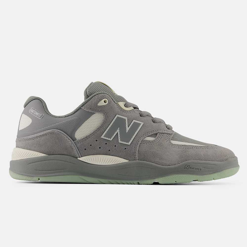 The 1010 PS Tiago Lemos Slate Grey Sea Salt New Balance Numeric Suede Skateboarding Shoes feature suede and mesh panels, a durable ABZORB midsole, large N logo, and textured rubber sole on a white background.