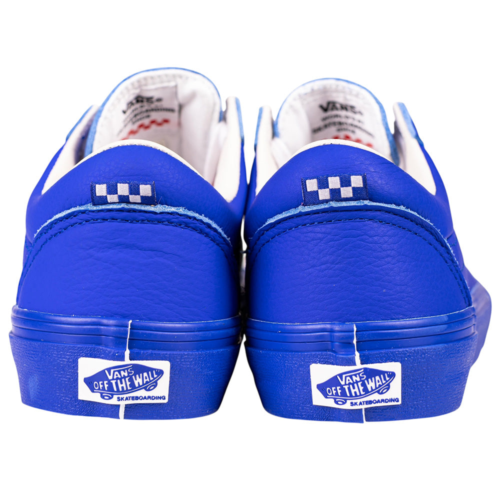 A pair of Skate Old Skool Vans VN000EC6NAV1 Chillie 2 Risers Navy White Skateboarding Shoes seen from the back, featuring the Vans Off The Wall logo on the heel, a white checkerboard above the tab, and reliable grip.