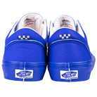 A pair of Skate Old Skool Vans VN000EC6NAV1 Chillie 2 Risers Navy White Skateboarding Shoes seen from the back, featuring the Vans Off The Wall logo on the heel, a white checkerboard above the tab, and reliable grip.