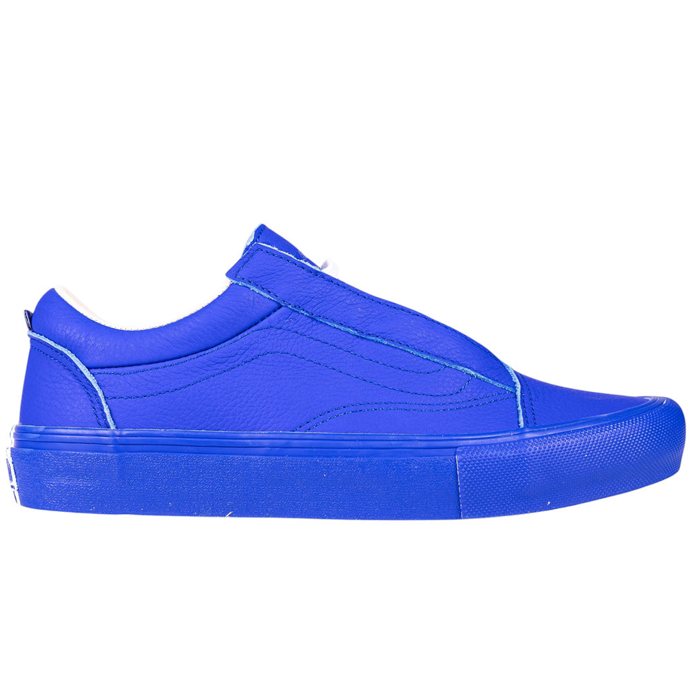 The Skate Old Skool Vans VN000EC6NAV1 Chillie 2 Risers Navy White Skateboarding Shoe is a slip-on with a low profile, textured sole for grip, and visible stitching, shown in side view against a white background.