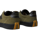 340 IWT New Balance Numeric suede skateboarding shoes in olive green with a reinforced toe cap, black midsoles, and patterned gum rubber heel inserts for impact protection.