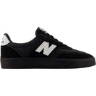 The 340 YRW Black White New Balance Numeric Suede Skateboarding Shoes, shown in a side view on a white background, feature impact protection for enhanced comfort during every step. These sneakers are black with a white N logo on the side, white heel detail, and a black sole.