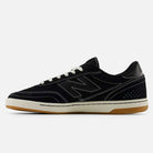 The 440 BCO Black White New Balance Numeric Suede Skateboarding Shoe features white stitching, a durable white sole with ABZORB midsole, gum outsole, and signature N logo—shown from the left side against a plain white background.