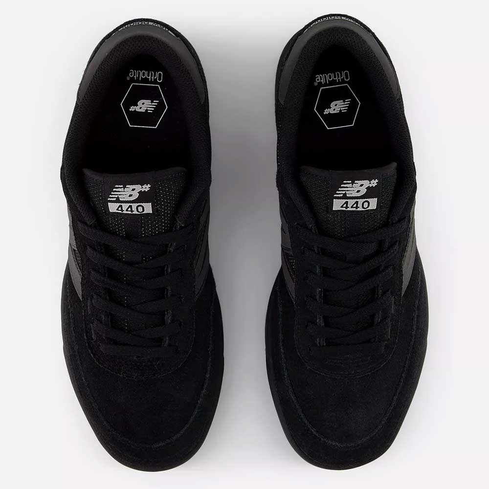 A top view of the 440 BVU New Balance Numeric Suede Skateboarding Shoes showcases their black colorway, complete with black laces, black soles, and white New Balance branding on the tongue and insole—emphasizing this durable skate shoe that’s perfect for both style and performance.