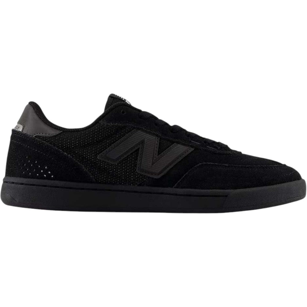 A black 440 BVU New Balance Numeric suede skateboarding shoe with a suede and mesh upper, featuring a black “N” logo on the side and a durable black rubber sole. The shoe is shown from the left side against a white background.