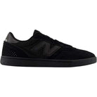 A black 440 BVU New Balance Numeric suede skateboarding shoe with a suede and mesh upper, featuring a black “N” logo on the side and a durable black rubber sole. The shoe is shown from the left side against a white background.