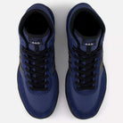 A pair of Vintage Indigo Black 440 HNN New Balance Numeric suede skateboarding shoes, seen from above with black laces, perforated toe boxes, "440" and "NB" tongue branding, and a comfortable ABZORB midsole.