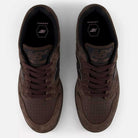 Top-down view of a pair of Chocolate Brown 480 CHC New Balance Numeric suede skateboarding shoes with leather details, black interiors, and the New Balance logo visible on each tongue.