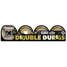 Illustration of 58mm Double Duro Black Gum Mini Combo OJ Wheels, showing cross-section and specs: 95A inner, 99A outer, mini combo shape—details highlighted in bold yellow and white text.