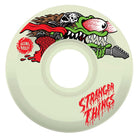 The 60mm Stranger Things Meek Slasher Eddie OG Slime GITD 78a Slime Balls Wheels feature a cartoon monster with sharp teeth, red eyes, and wild hair playing guitar, plus bold red SLIME BALLS and STRANGER THINGS logos for a wild retro vibe.