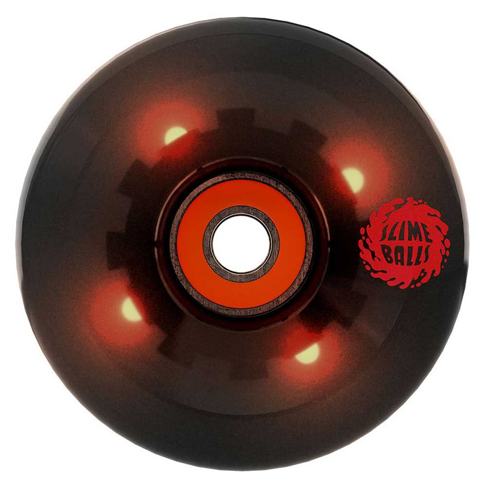 Experience standout style with the 66mm Prayer Candle Light Ups OG Slime Transparent Black 78a Slime Balls Wheels. These black skateboard wheels feature a red center, an orange inner ring, and the iconic Slime Balls logo in bold red on the outer edge. Their glossy surface reflects light while built-in LEDs make them glow brilliantly as you cruise, delivering both eye-catching appeal and the smooth ride of 78a cruiser wheels. Perfect for riders seeking a unique look and vibrant performance!.