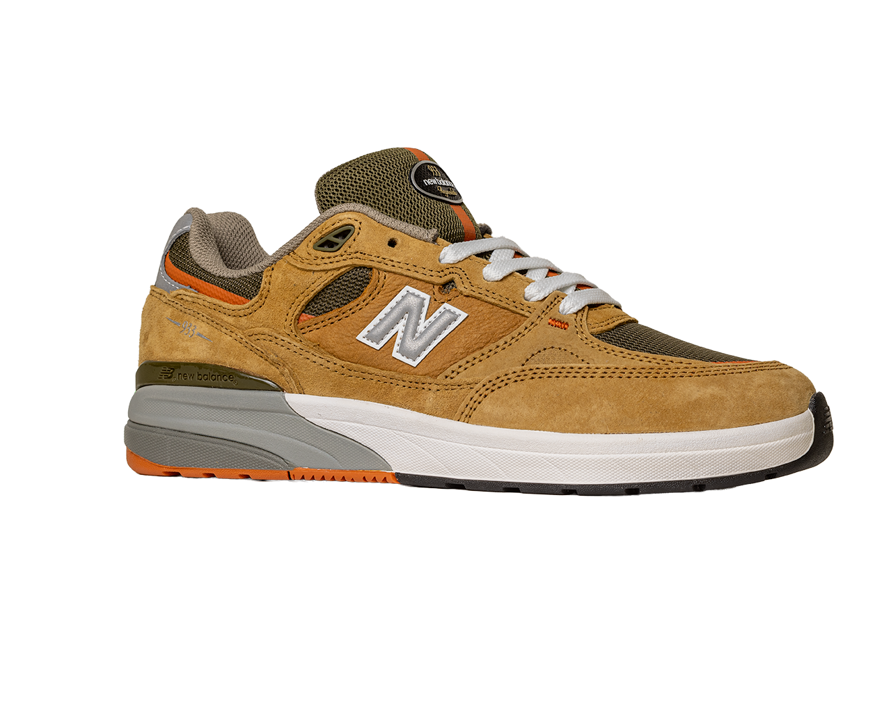 The 933 MNO Andrew Reynolds Brown Grey New Balance Numeric Skateboarding Shoes feature tan suede overlays, olive green mesh, orange accents, a white N logo, white midsole, grey and orange outsole, and white laces on a plain white background.