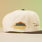 The Oompa Pink Box Houston Astros New Era Hat 5950 Fitted features a cream crown, brown brim, embroidered Astrodome patch, and side "Astros" script—ideal for fans looking to show their Houston pride.