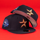 The 6am in Texas Navy Red White New Era Hat 5950 Fitted is displayed on a vibrant red background, with one cap tilted to reveal the brim’s underside, highlighting its classic New Era style.