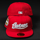 Two Sunnyside Bo Bundy WS05 Houston Astros New Era 5950 Fitted hats are shown; one displays the front with the Astros logo and side patch, while the other shows the back with the MLB logo, both on a black background.