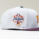 The Shibuya Lights New Era Silver Japan Houston Astros 5950 Fitted Hat features an embroidered Japan All-Star Series 2014 patch with a baseball graphic and colorful side details.