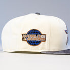 The Dark:30 New Era Chrome Black Camo Houston Astros 5950 Fitted Hat features a unique camo design with a stylish logo patch on the side and a gray brim, blending modern edge with classic Astros style.