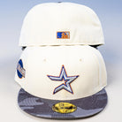 Two Dark:30 New Era Chrome Black Camo Houston Astros 5950 Fitted Hats are stacked. The front hat has a blue and orange Astros star logo, a gray Chrome Black Camo brim, circular side patch, and the back features an MLB logo patch.