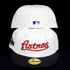 Two Red Soda New Era HOF Red Black Chrome Houston Astros 5950 Fitted hats are shown. The front displays "Astros" in red script, the back features an MLB logo, and a side patch accents the front cap.