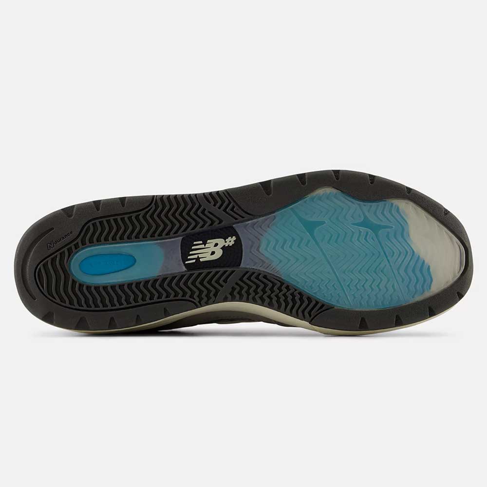 The image shows the sole of the 933 GRY Andrew Reynolds Gray Day New Balance Numeric Suede Skateboarding Shoe, with a heritage design in black, grey, and light blue, textured pattern, and a white NB logo at the center.