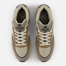 Top-down view of 933 GRY Andrew Reynolds Gray Day New Balance Numeric suede skateboarding shoes in gray, with premium cushioning, white laces, mesh and suede panels, plus black tongue labels showing the brand and model name.