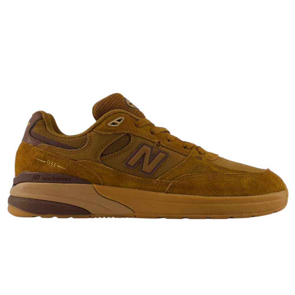 A brown WIDE 933 LRO Andrew Reynolds New Balance Numeric suede skateboarding shoe is shown in profile, featuring suede and mesh materials, a prominent N logo on the side, an ABZORB midsole for enhanced cushioning, and a two-tone tan and brown rubber sole.