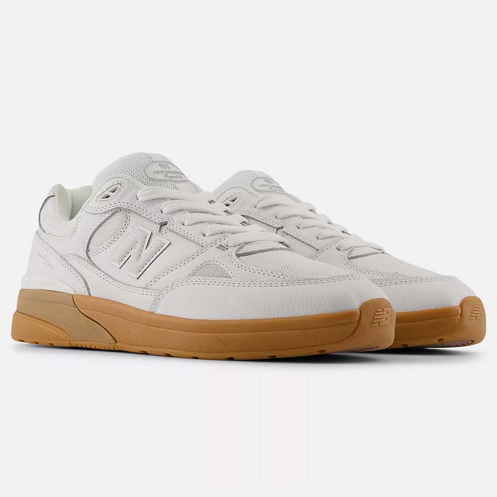 The 933 WWB White Black Andrew Reynolds New Balance Numeric Suede Skateboarding Shoes feature mesh and leather uppers, gum rubber soles, and signature side N logos, inspired by Andrew Reynolds and shown on a plain white background.