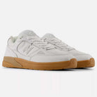 The 933 WWB White Black Andrew Reynolds New Balance Numeric Suede Skateboarding Shoes feature mesh and leather uppers, gum rubber soles, and signature side N logos, inspired by Andrew Reynolds and shown on a plain white background.