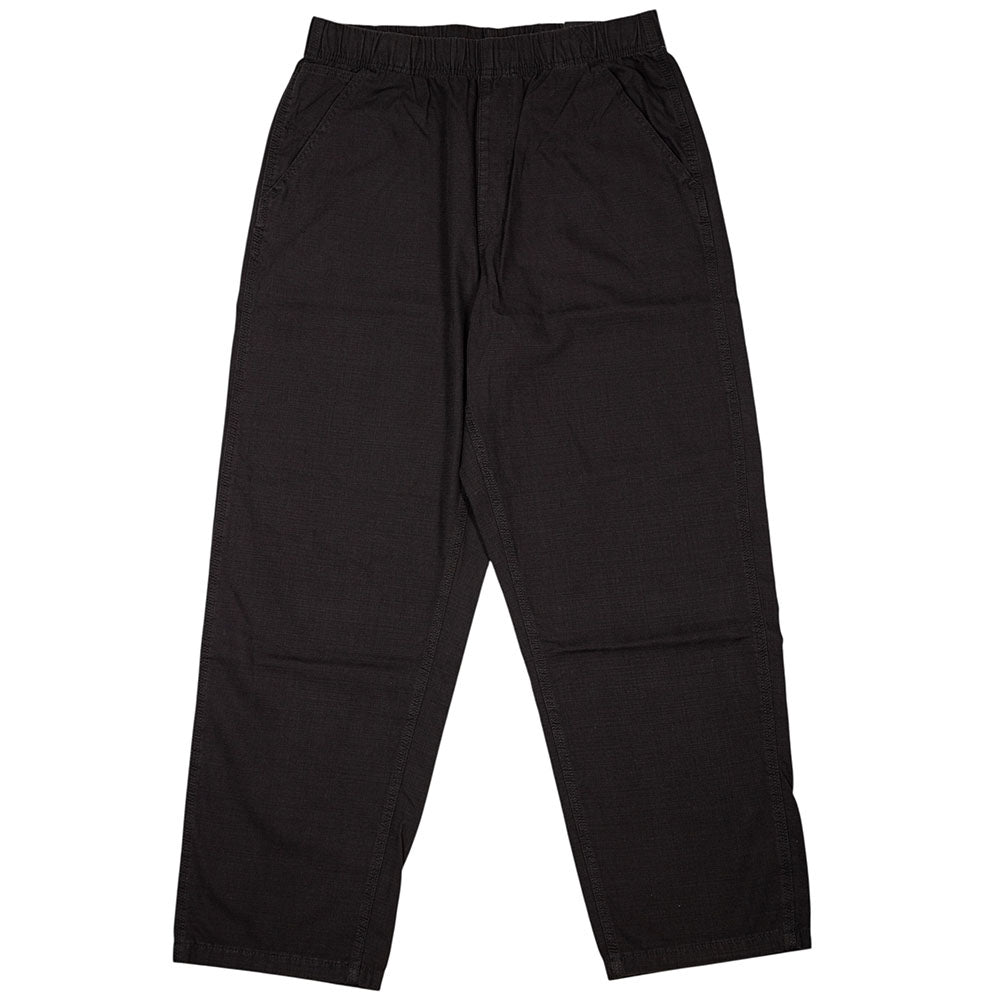 The Vans Addison Barrel Black VN0010HYBLK Pants—a pair of loose-fitting black pants made from durable micro ripstop fabric, featuring an elastic waistband and side pockets—are shown laid flat on a white background.