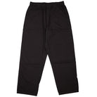 The Vans Addison Barrel Black VN0010HYBLK Pants—a pair of loose-fitting black pants made from durable micro ripstop fabric, featuring an elastic waistband and side pockets—are shown laid flat on a white background.