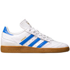 Introducing the Busenitz Blue White Gum IE3101 Adidas Skateboarding Leather Shoes: crafted in white leather with signature blue stripes, blue accents on the heel and tongue, gold “Busenitz” lettering, a durable brown gum sole, and crisp white laces. As part of the adidas skateboarding collection, these shoes proudly display the iconic Adidas logo on both the sole and tongue.