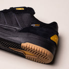 Close-up of the KJ5054 Cordura Carbon Black Tekkira Cup Adidas Skateboarding Suede Shoes, showcasing durable Cordura fabric, suede upper, yellow accents, textured tan outsole, and visible stitching on a neutral background.