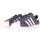 A pair of Grey White Superstar 80 ADV HQ9289 Adidas Skateboarding Leather Shoes featuring classic white leather, durable rubber shells, and signature three stripes—ideal for skateboarding with timeless style.