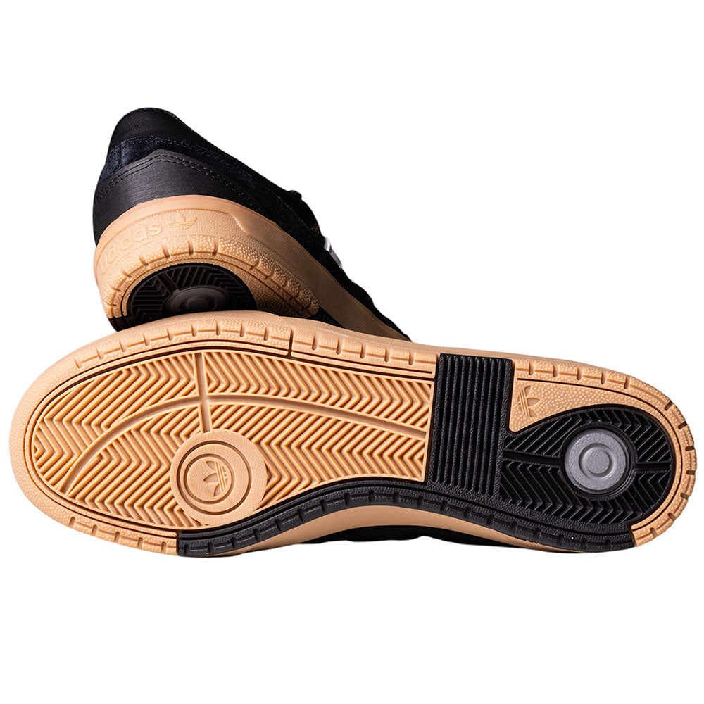 A pair of Black White Gum Tyshawn 2 II HQ4734 Adidas Skateboarding Shoes, featuring premium leather uppers, tan rubber soles with black grip sections, and a responsive Lightstrike midsole for added comfort.