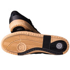 A pair of Black White Gum Tyshawn 2 II HQ4734 Adidas Skateboarding Shoes, featuring premium leather uppers, tan rubber soles with black grip sections, and a responsive Lightstrike midsole for added comfort.