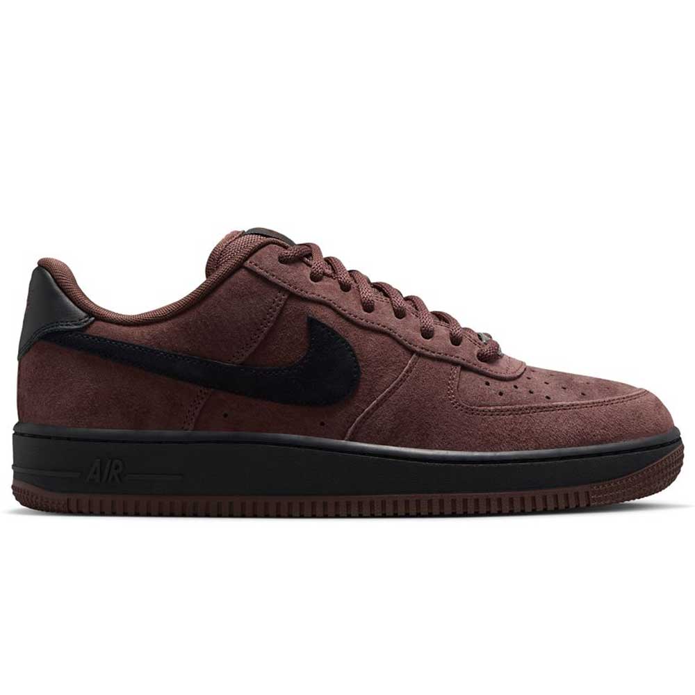 The Air Force 1 Black Light Chocolate HM8517201 Nike SB Suede Skateboarding Shoe features a brown suede upper with a black swoosh, heel, and sole, along with signature Nike Air cushioning for enhanced comfort. This stylish skate shoe is shown in a side profile against a plain white background.