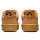 Back view of two Air Force 1 Flax Black Gum Light Brown HM8517200 Nike SB suede skateboarding shoes with black Nike SB Air logos on the heels and gum soles, placed side by side on a white background.