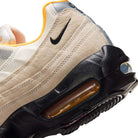 Close-up of the Air Max 95 Sail Black Laser Orange Nike SB Skateboarding Shoes (IQ8395100) featuring a visible Air Max sole, black Nike swoosh, orange inner lining, and textured black outsole for optimal skateboarding grip.