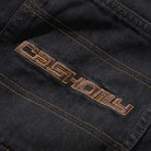 Close-up of Aleka Denim Jeans Flat Black Cash Only COD153202, showing black fabric with bold orange "CASHONLY" embroidery and orange stitching in a modern font.
