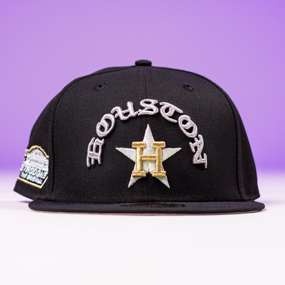 The Summer Nights Trilogy Houston Astros New Era Hat 5950 Fitted Black Gold features "Houston" in white over a gold H and silver star on a purple background, plus a stylish side patch.
