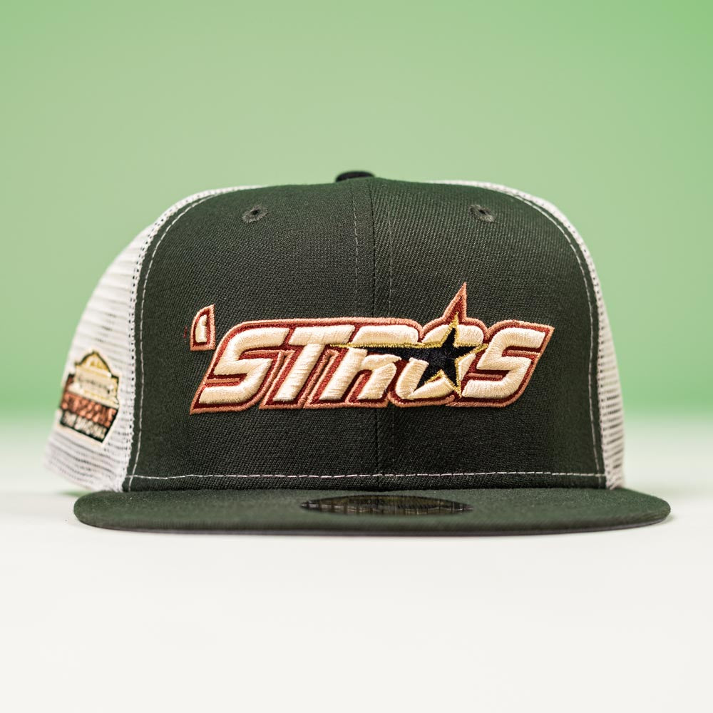 The El Jimador Stone Mesh Houston Astros New Era 5950 Fitted Hat features bold STROS lettering and a star design—a stylish must-have for fans seeking standout Astros headwear.