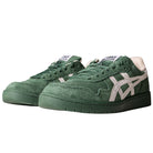 A pair of Japan Pro Asics Forest Night Cream 1201A920300 suede skateboarding shoes in green with white accents and off-white lining, featuring a classic design with side stripes and visible stitching, displayed on a white background.