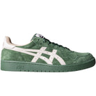 The Japan Pro Asics Forest Night Cream 1201A920300 Suede Skateboarding Shoe features green suede, white ASICS side logo, cream collar detail, and a green rubber sole. Shown from the side on a plain white background.