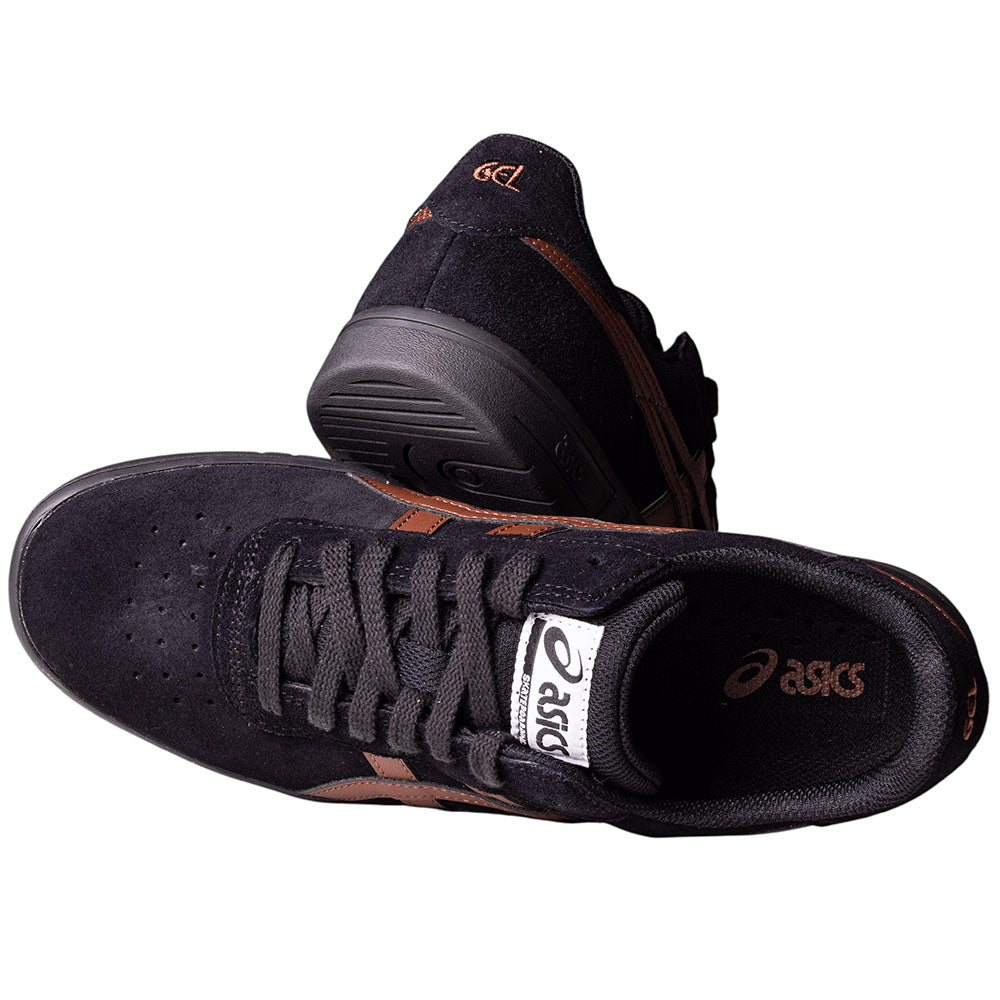 A pair of Gel Vikka Pro Asics Black Reddish Brown 1201A486007 suede skateboarding shoes—one upright showing the side and top, the other on its side displaying the sole and heel.