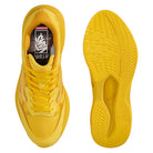 Top and bottom views of bright yellow Atiba Vans AVE Rapid LX Gold VN000Y1MGLD Suede Skateboarding Shoes featuring FeatherKnit construction and a textured rubber outsole.