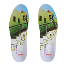 Pair of Impact Protection PopCush insoles from the Atiba Vans Sk8 HI Black Multi VN0A5FCCBOV Suede Skateboarding Shoes, featuring a graphic of a skateboarder jumping over a handrail with branding text printed at the heel.