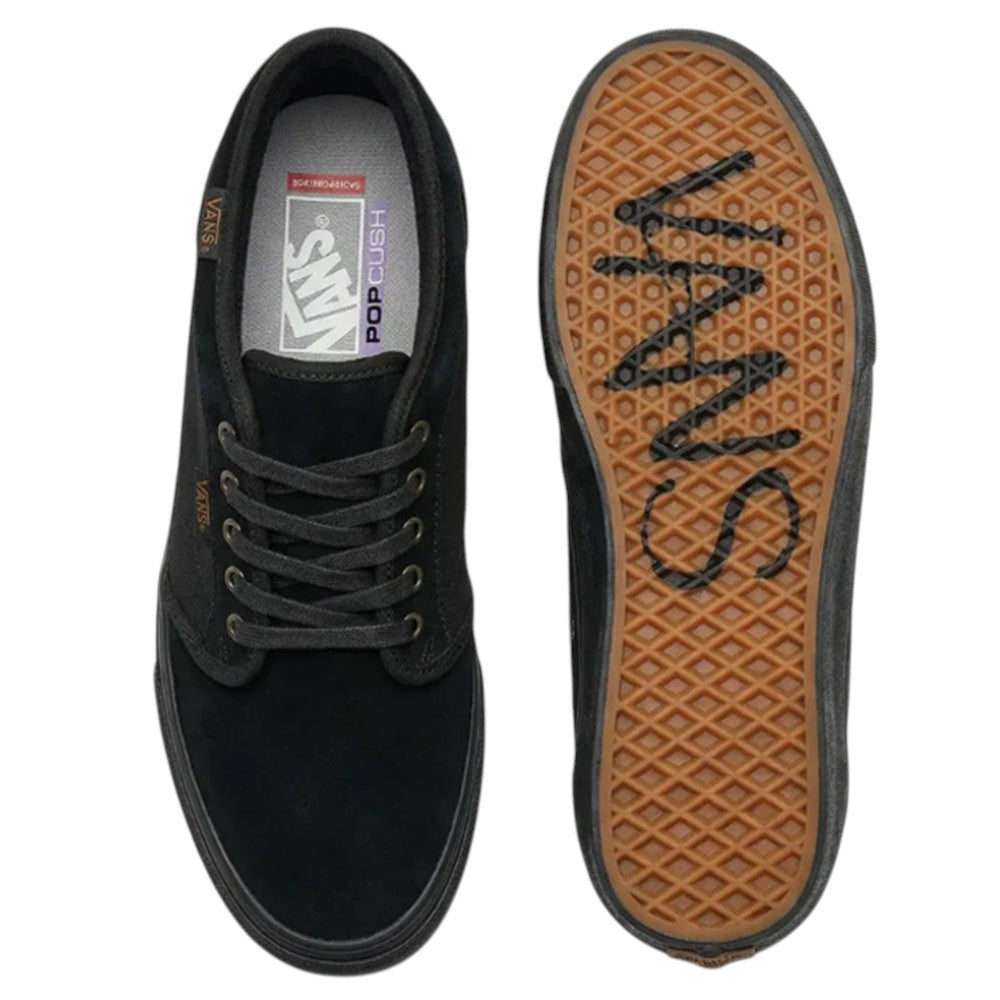 An Atiba Vans Skate Chukka Black Black VN0A7SLZBKA1 Suede Skateboarding Shoe shown from above, with its tan, diamond-patterned rubber outsole displayed next to it.